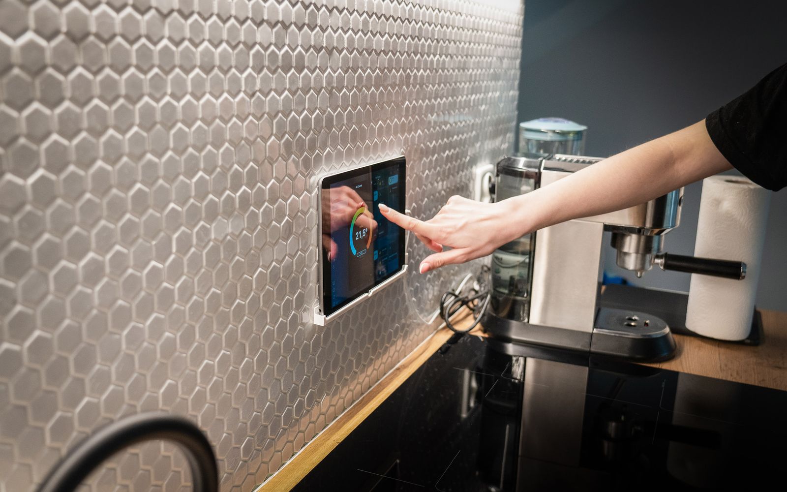 Wall-mounted smart home touch panel controlling room temperature
